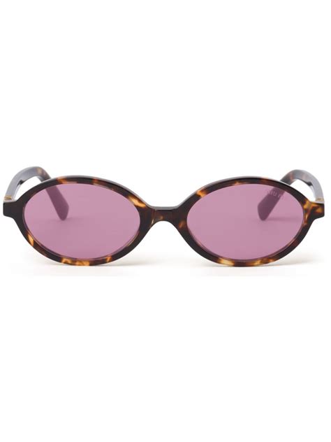 Miu Miu Sunglasses & Glasses .